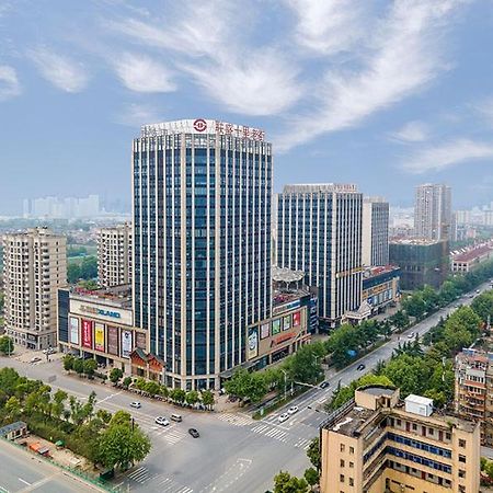 Vienna International Hotel Jiujiang Shili Street מראה חיצוני תמונה